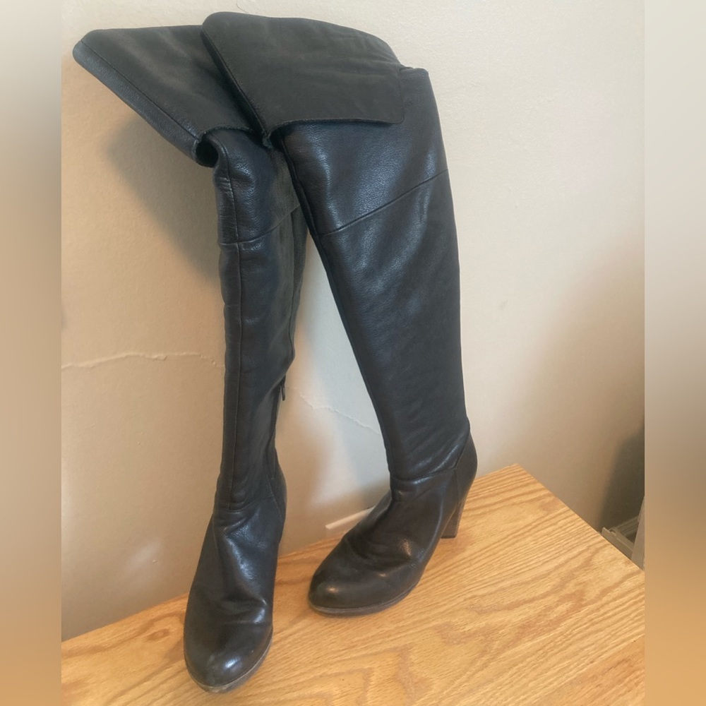Black leather over-the-knee boots